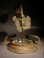 Greek bronze Siren. Hydria handle