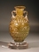 Sidonian mold blown yellow glass flask with tendril scrolls