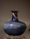 Early Roman marbled blue and white glass flask
