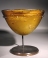 Hellenistic amber golden-yellow glass molded conical bowl.