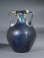 Roman blue glass amphoriskos.