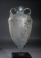 Roman light blue amphora with two handles and pointed base.