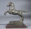 Roman bronze galloping horse.