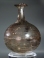 Roman light purple glass bottle with white glass spiral thread and trefoil rim.