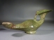 Byzantine bronze lamp with a cross and blossom handle.