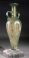 Roman green glass amphoriskos.