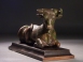 Greek Classical bronze recumbent bull.