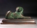 Greek Archaic bronze lion.