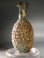 Roman molded amber glass grapes flask