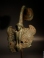 Greek bronze Siren. Hydria handle