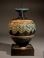 Greek core-formed blue glass amphoriskos with turquoise and yellow glass trailing.