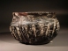 Early Roman purple glass ribbed bowl with white marvered trail