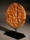 Early Christian terracotta stamp depicting Christ or King David as Orpheus, playing the harp before the animals