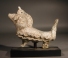Early Islamic glass lion (zoomorphic balsamarium).