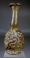 Roman light yellow glass Janus head tall flask.