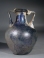Roman blue glass amphoriskos.