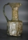 Early Christian light olive green hexagonal glass jug with three crosses.
