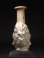 Roman molded opaque white glass Medusa Janus head flask.