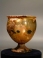 Roman yellowish green glass goblet.