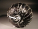 Early Roman purple glass ribbed bowl with white marvered trail