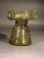 Roman olive green glass sprinkler with decorative handles around rim.