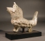 Early Islamic glass lion (zoomorphic balsamarium).