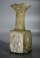 Early Christian light olive green hexagonal glass jug with three crosses.