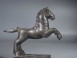 Roman bronze galloping horse.
