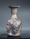 Roman molded purple glass Janus Medusa head flask.