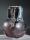Roman purple glass aryballos with marbled blue glass handles