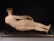 Parthian alabaster reclining figurine of a woman, possibly Aphrodite.