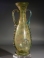 Roman greenish yellow glass amphora with turquoise-green glass twin handles.