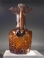 Early Byzantine molded honey-amber glass hexagonal flask.