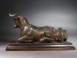 Greek Classical bronze recumbent bull.