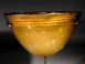 Hellenistic amber golden-yellow glass molded conical bowl.