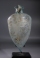 Roman light blue amphora with two handles and pointed base.