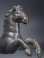 Roman bronze galloping horse.