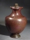 Roman bronze oinochoe with panther handle.