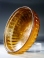 Early Roman golden-amber glass ribbed bowl.
