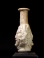 Roman molded opaque white glass Medusa Janus head flask.