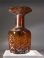 Early Byzantine molded honey-amber glass hexagonal flask.