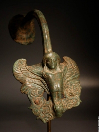 Greek bronze Siren. Hydria handle