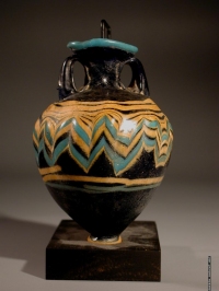Greek core-formed blue glass amphoriskos with turquoise and yellow glass trailing.