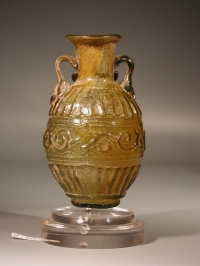 Sidonian mold blown yellow glass flask with tendril scrolls