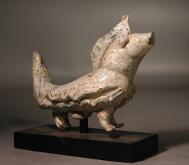 Early Islamic glass lion (zoomorphic balsamarium).