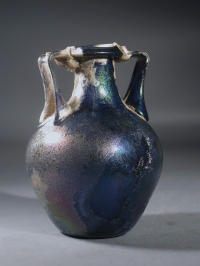 Roman blue glass amphoriskos.