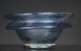 Early Roman blue glass small cosmetic bowl.
