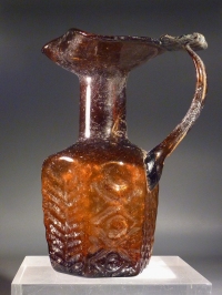 Early Byzantine molded honey-amber glass hexagonal flask.