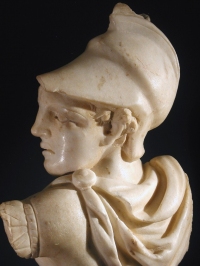 Roman marble of a Greek warrior, a fragmentary sarcophagus relief.