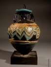 Greek core-formed blue glass amphoriskos with turquoise and yellow glass trailing.
